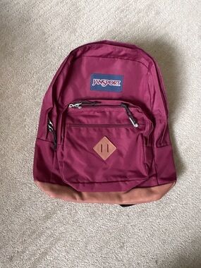 backpack leather side straps Leather Roll Top Backpack with X Strap